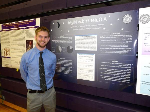 student at a research forum